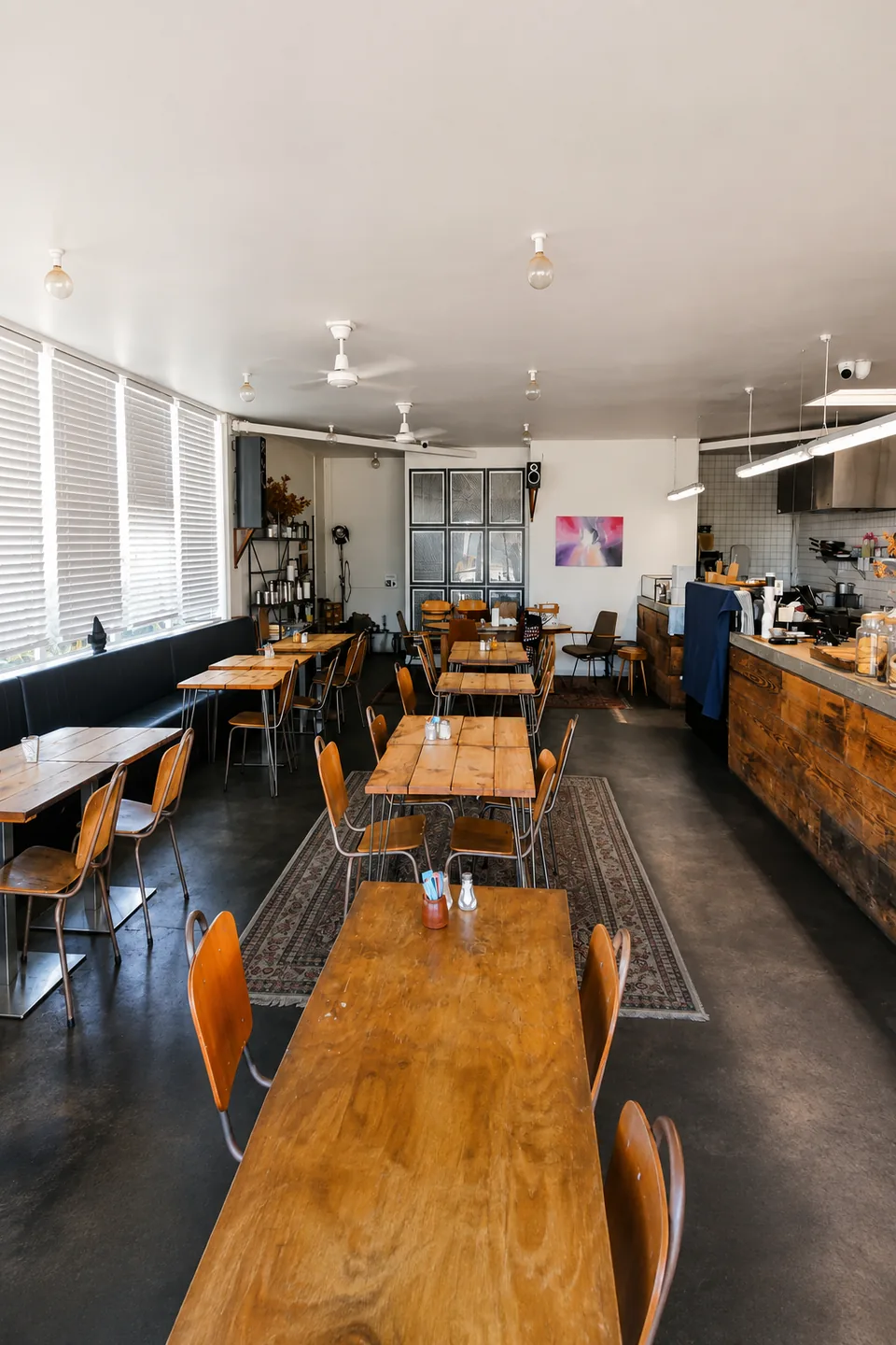 Tables and the counter inside Gentle Giant Cafe