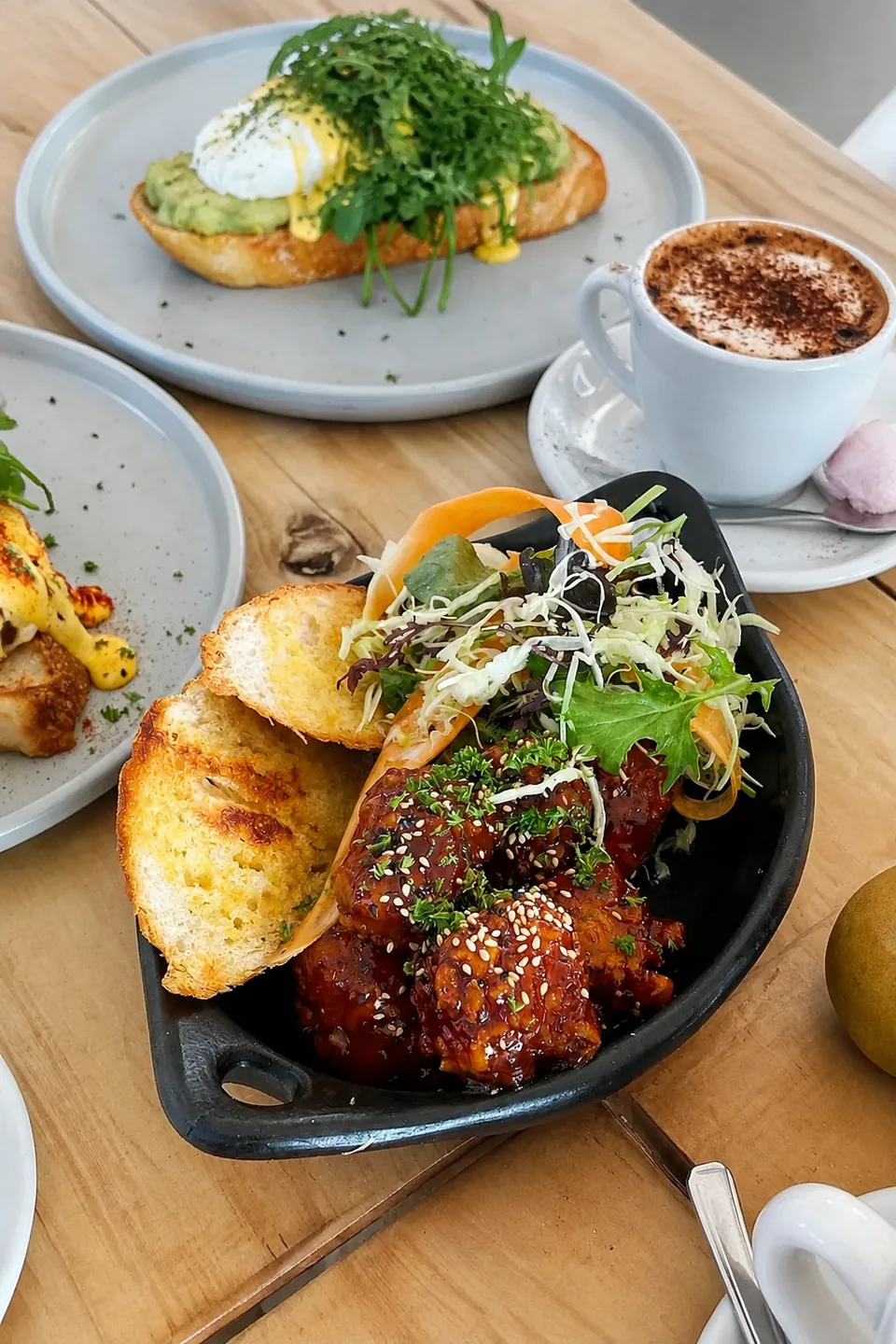 A cafe plate with toasted bread and coffee